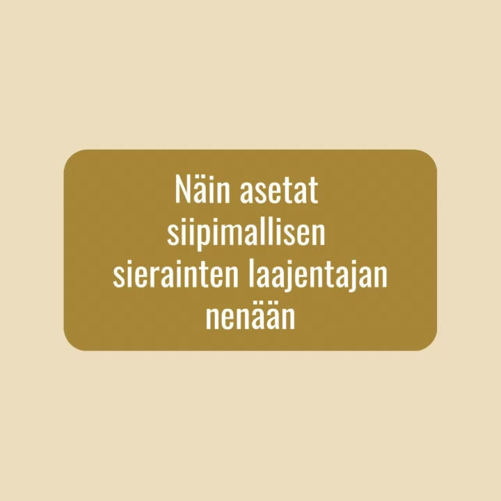 Siipimallisen sierainten laajentajan asettaminen nenään.